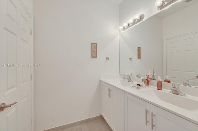 20900 NE 2nd Ct, Miami, FL 33179 - bathroom with a sink, baseboards, double vanity, and tile patterned flooring