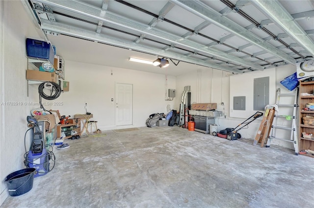 20900 NE 2nd Ct, Miami, FL 33179 - garage featuring a garage door opener and electric panel