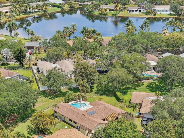bird's eye view featuring a water view and a residential view