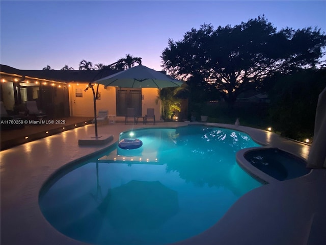 outdoor pool featuring a patio