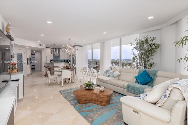 100 S Birch Rd Unit 1602C, Fort Lauderdale, FL 33316 - living area featuring a chandelier, recessed lighting, floor to ceiling windows, and ornamental molding