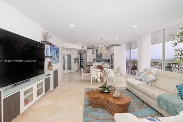 100 S Birch Rd Unit 1602C, Fort Lauderdale, FL 33316 - living room with a chandelier, recessed lighting, light marble finish floors, and floor to ceiling windows