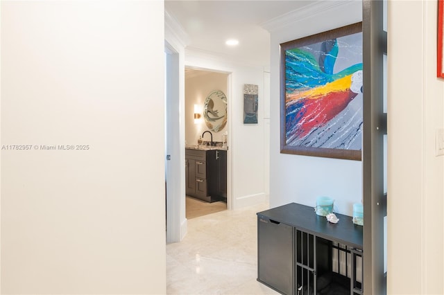 100 S Birch Rd Unit 1602C, Fort Lauderdale, FL 33316 - corridor featuring ornamental molding, a sink, and recessed lighting