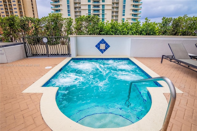 100 S Birch Rd Unit 1602C, Fort Lauderdale, FL 33316 - view of pool with a swimming pool and a hot tub