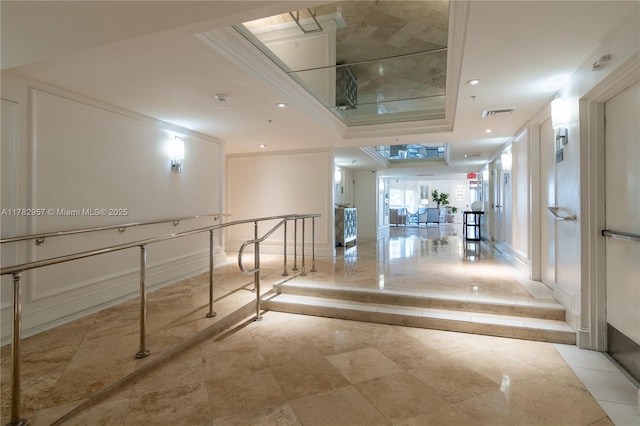 100 S Birch Rd Unit 1602C, Fort Lauderdale, FL 33316 - hallway with inlaid floor details, crown molding, baseboards, a raised ceiling, and recessed lighting