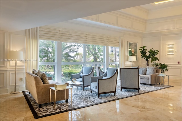 100 S Birch Rd Unit 1602C, Fort Lauderdale, FL 33316 - common area with a decorative wall, ornamental molding, and a high ceiling