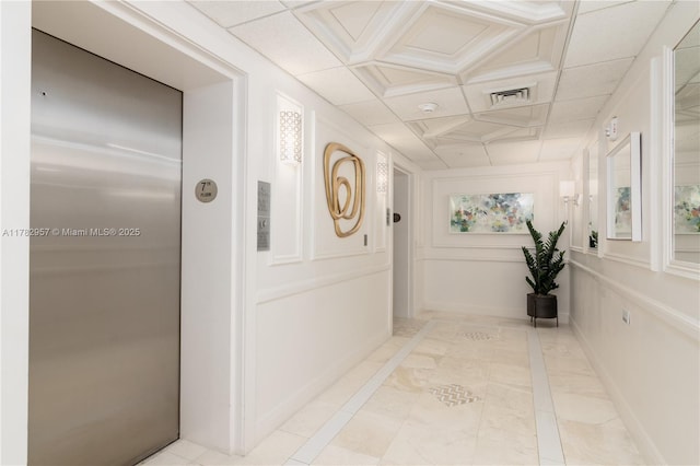 100 S Birch Rd Unit 1602C, Fort Lauderdale, FL 33316 - hallway featuring inlaid floor details, baseboards, and coffered ceiling