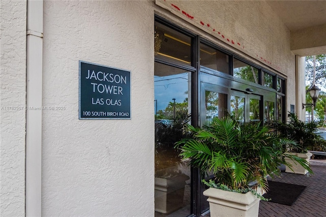 100 S Birch Rd Unit 1602C, Fort Lauderdale, FL 33316 - doorway to property with stucco siding