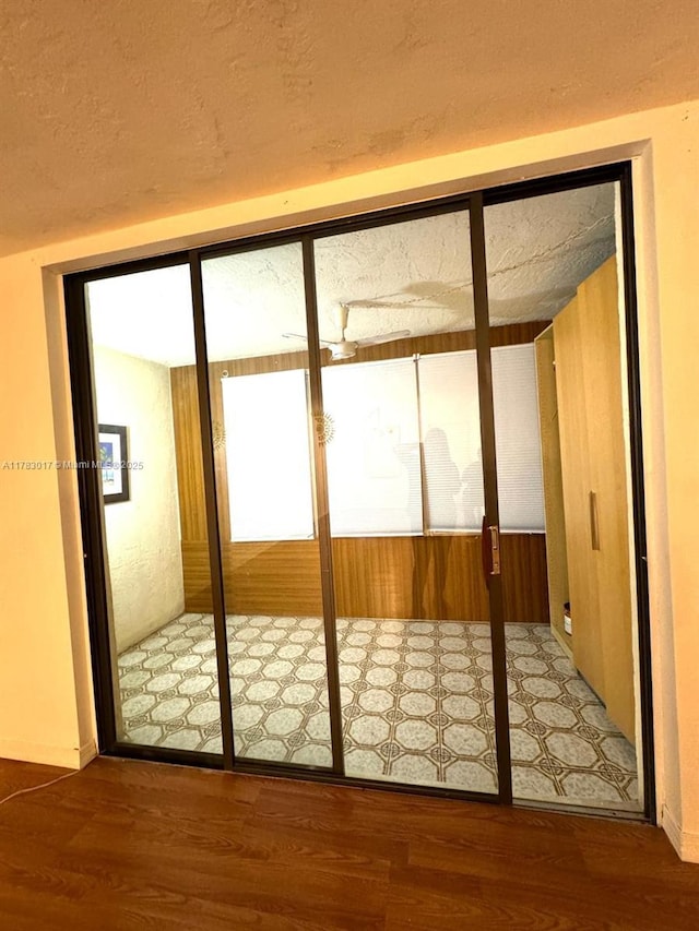 doorway featuring wood finished floors