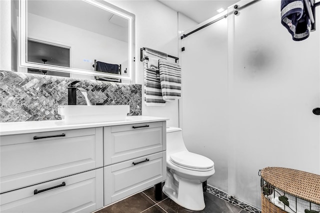 9 Bass Ave, Key Largo, FL 33037 - full bath featuring tile patterned floors, tasteful backsplash, toilet, vanity, and a shower stall