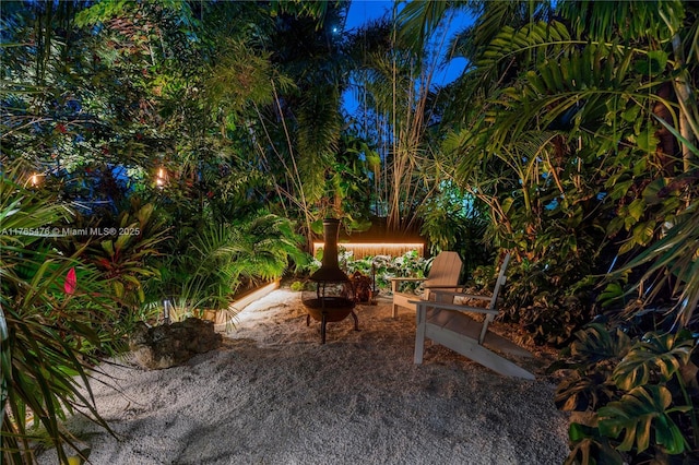 9 Bass Ave, Key Largo, FL 33037 - view of patio featuring a fire pit
