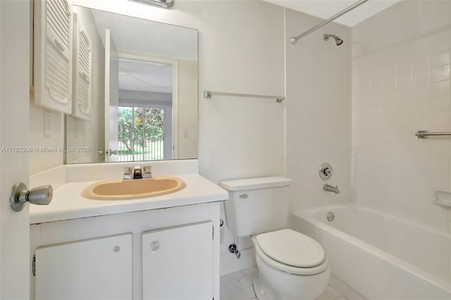 bathroom with toilet, vanity, tile patterned flooring, and tub / shower combination