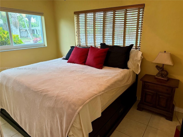 bedroom with tile patterned flooring