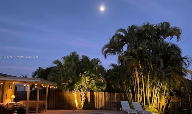 view of yard with a patio and fence