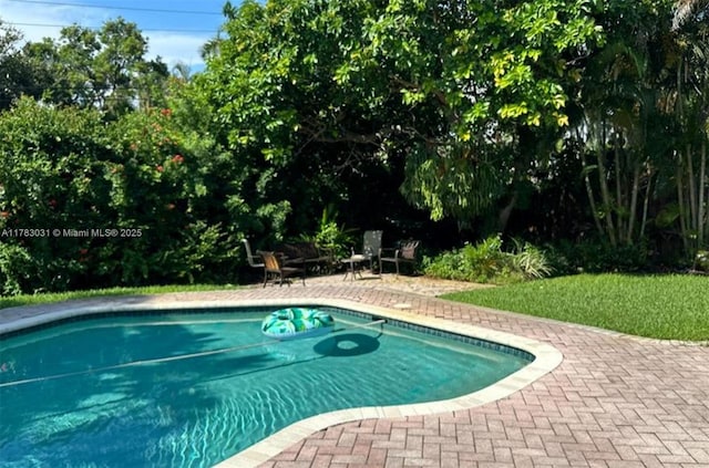 pool with a patio