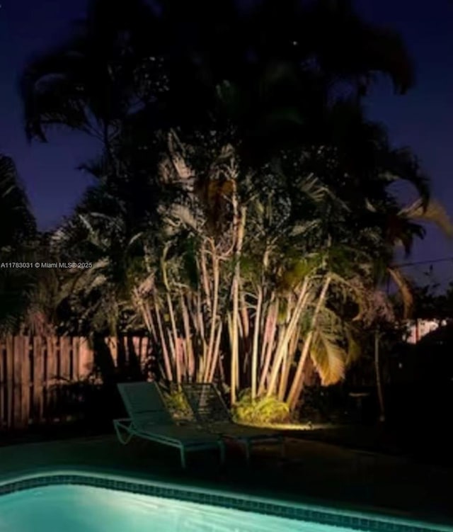 pool featuring fence