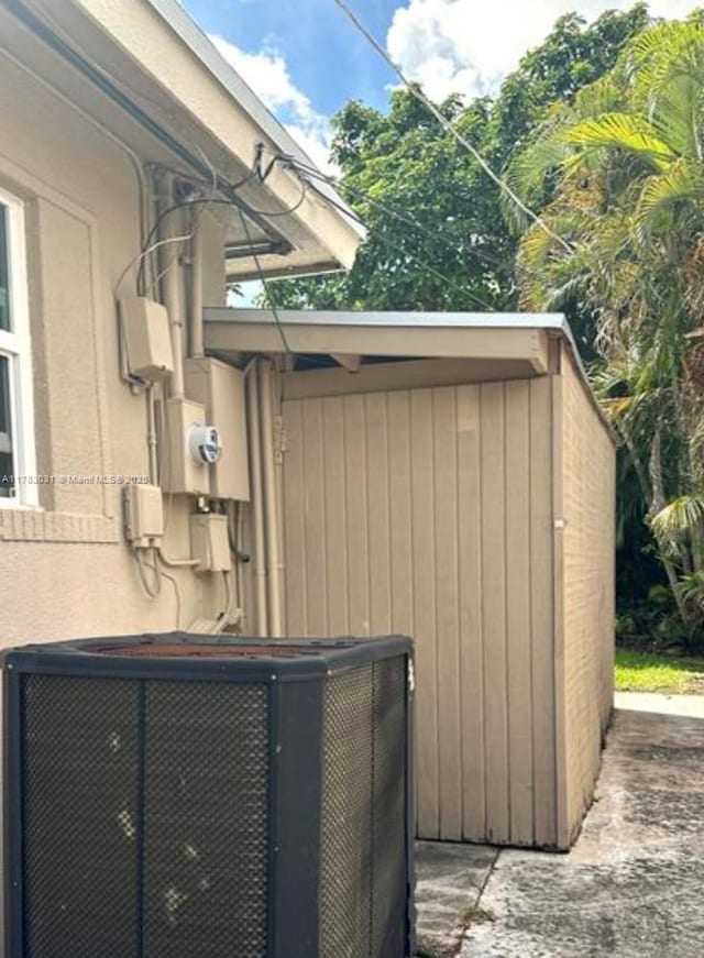 view of property exterior with central AC unit