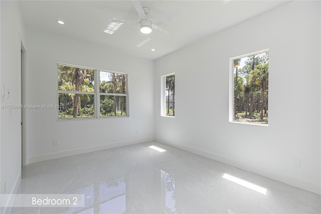 3802 30th Ave SE, Naples, FL 34117 - unfurnished room with plenty of natural light, baseboards, a ceiling fan, and recessed lighting