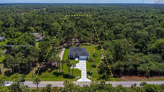 3802 30th Ave SE, Naples, FL 34117 - drone / aerial view of a heavily wooded area