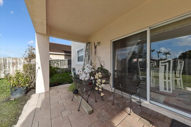15489 SW 150th St, Miami, FL 33196 - view of patio with fence