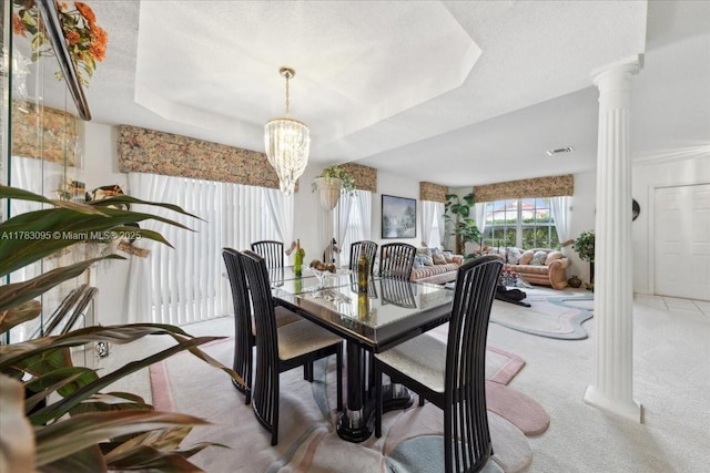 15489 SW 150th St, Miami, FL 33196 - dining room with decorative columns, a notable chandelier, and carpet flooring