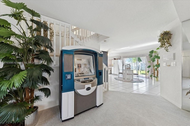 15489 SW 150th St, Miami, FL 33196 - hallway with light tile patterned floors, light colored carpet, and baseboards