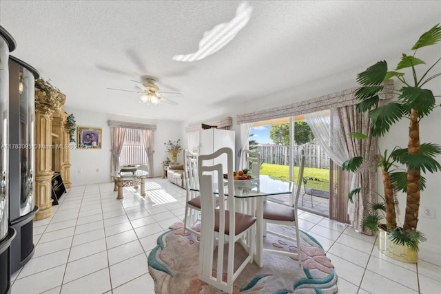 15489 SW 150th St, Miami, FL 33196 - dining room featuring light tile patterned floors, a textured ceiling, and ceiling fan