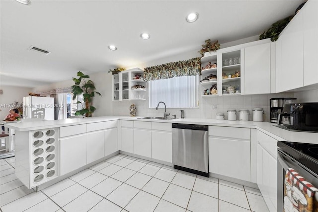 15489 SW 150th St, Miami, FL 33196 - kitchen featuring a sink, open shelves, stainless steel appliances, and decorative backsplash