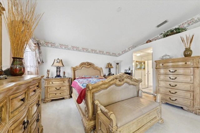 15489 SW 150th St, Miami, FL 33196 - bedroom featuring lofted ceiling, visible vents, ensuite bath, and light carpet
