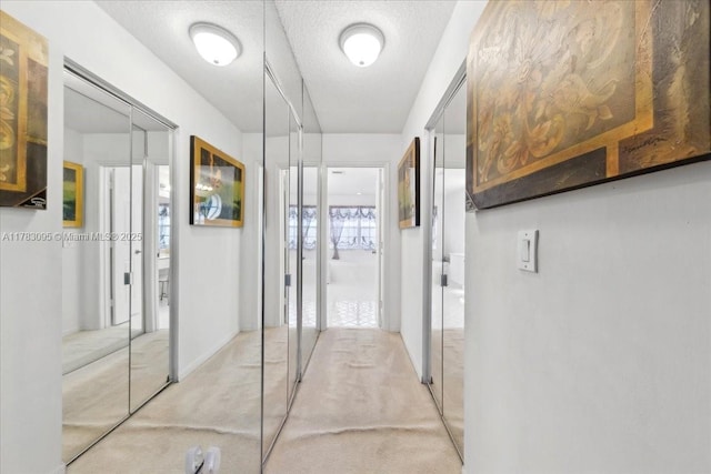 15489 SW 150th St, Miami, FL 33196 - hallway with a textured ceiling and light colored carpet
