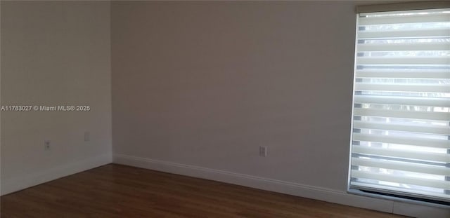 8850 SW 123rd Ct Unit H302, Miami, FL 33186 - empty room featuring wood finished floors and baseboards