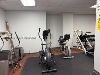 231 174th St Unit 2308, Sunny Isles Beach, FL 33160 - workout area featuring a drop ceiling