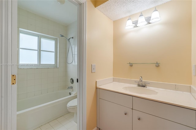 full bathroom featuring toilet, tile patterned floors, vanity, and shower / bathing tub combination