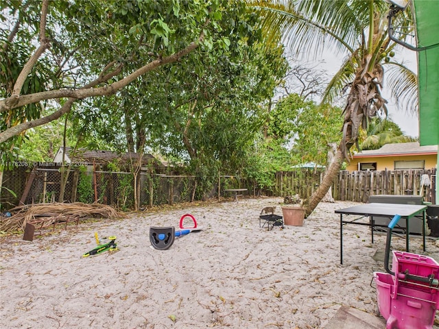 view of jungle gym featuring fence