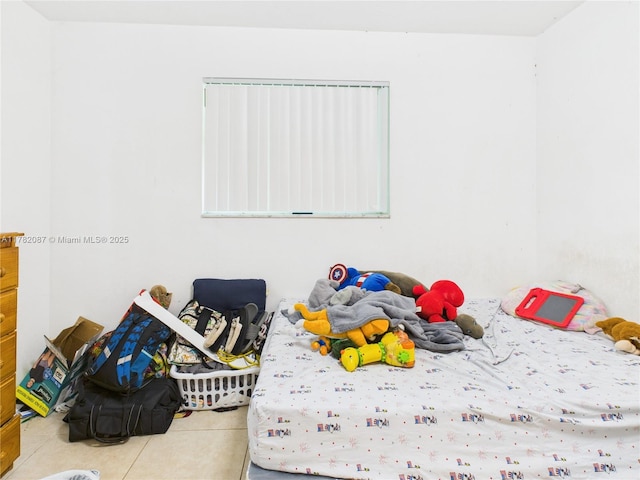 bedroom with tile patterned floors