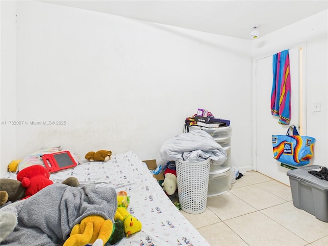 bedroom featuring tile patterned floors