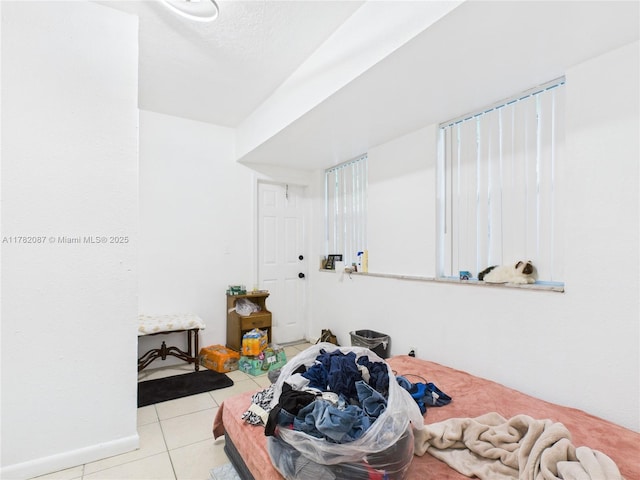 bedroom with tile patterned flooring