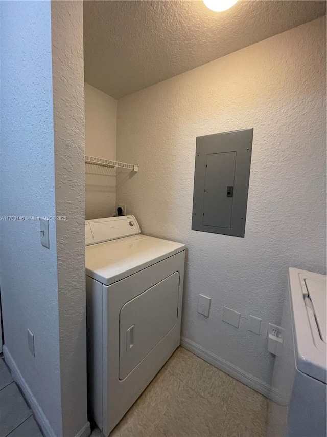 802 Belmont Ln Unit 802, North Lauderdale, FL 33068 - laundry room with laundry area, washer / dryer, electric panel, and a textured ceiling