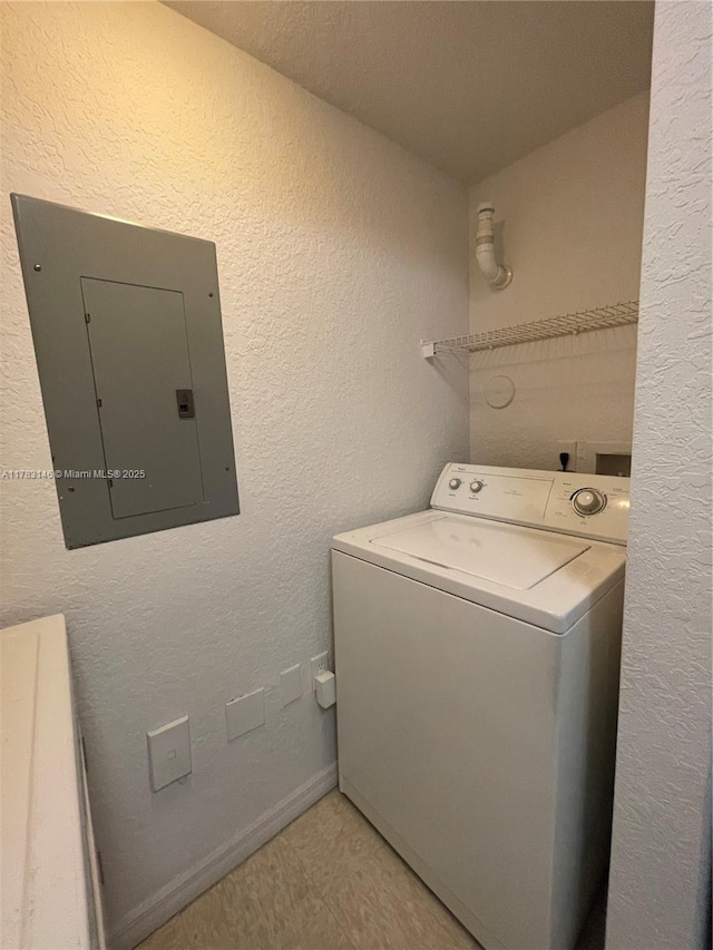 802 Belmont Ln Unit 802, North Lauderdale, FL 33068 - clothes washing area featuring washer / clothes dryer, baseboards, electric panel, laundry area, and light floors
