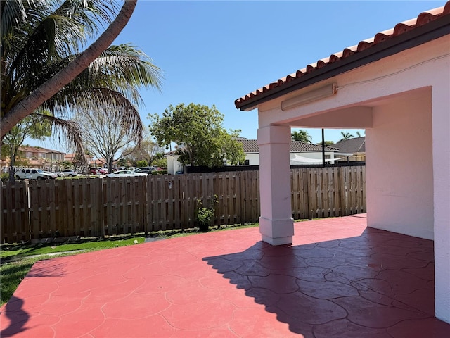 view of patio / terrace with fence