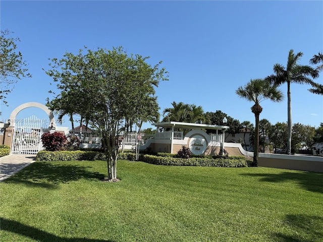 view of community featuring a lawn