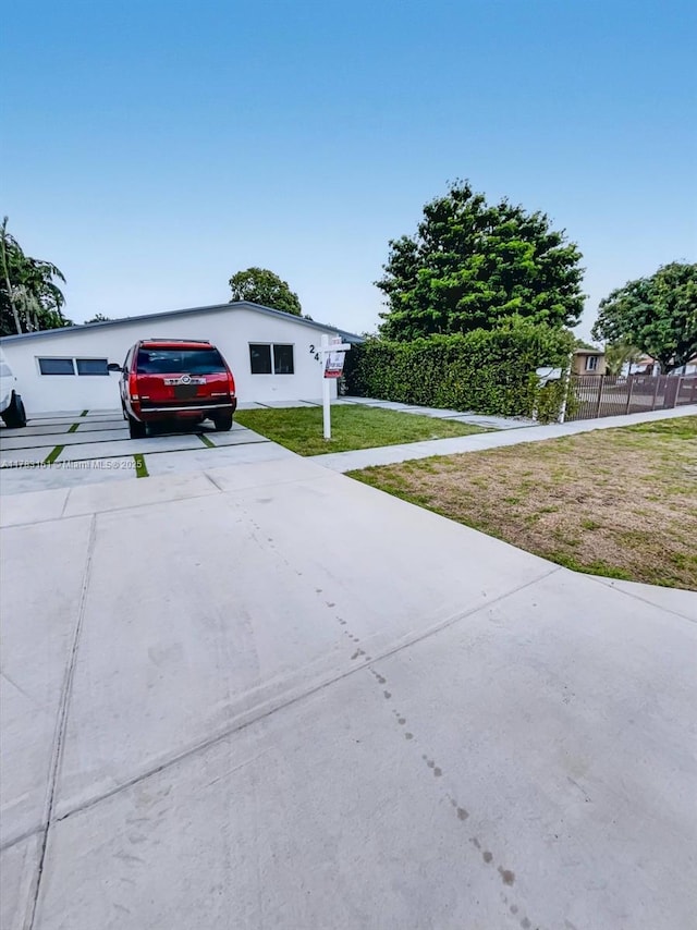 view of front of house featuring concrete driveway