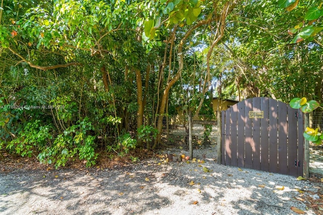 exterior space featuring a gate