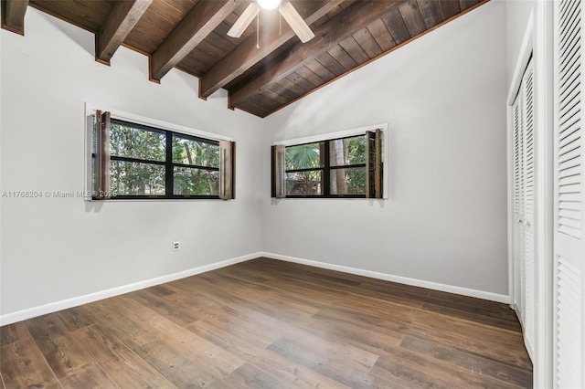 unfurnished bedroom featuring baseboards, dark wood-style flooring, wood ceiling, and vaulted ceiling with beams