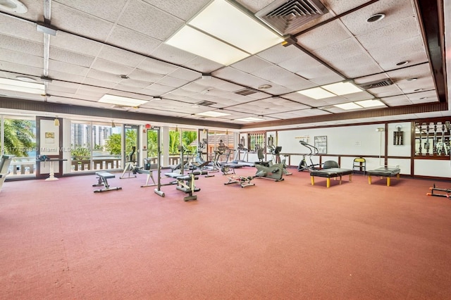 2851 Leonard Dr Unit J610, Aventura, FL 33160 - exercise room featuring a drop ceiling and carpet