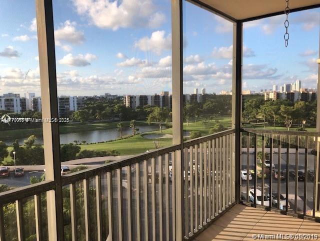20301 W Country Club Dr Unit 830, Aventura, FL 33180 - unfurnished sunroom with a water view, golf course view, and a view of city