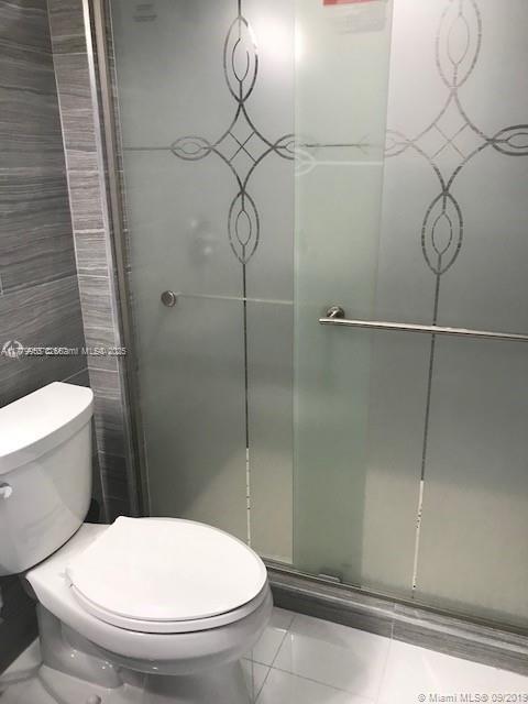 20301 W Country Club Dr Unit 830, Aventura, FL 33180 - bathroom with toilet and a stall shower