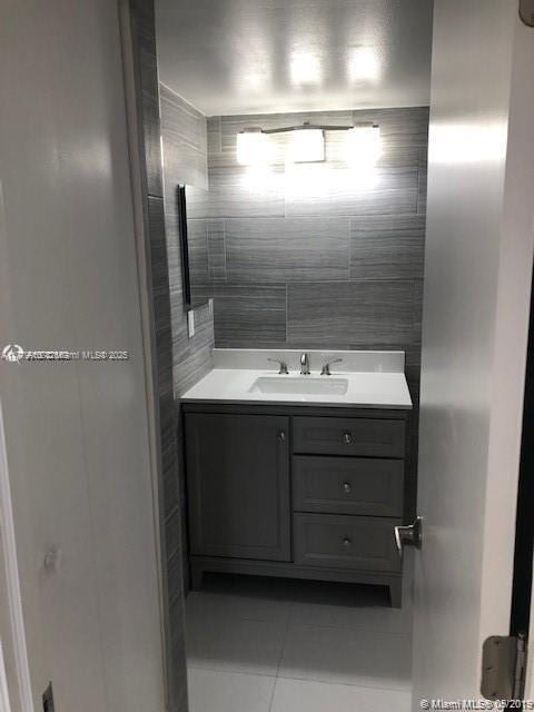 20301 W Country Club Dr Unit 830, Aventura, FL 33180 - bathroom featuring vanity and tile patterned flooring