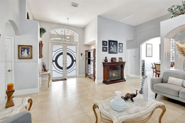 4060 SW 152nd Ave, Miramar, FL 33027 - foyer entrance featuring plenty of natural light, arched walkways, visible vents, and a high ceiling
