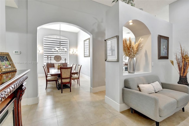 4060 SW 152nd Ave, Miramar, FL 33027 - dining room featuring light tile patterned floors, baseboards, and arched walkways